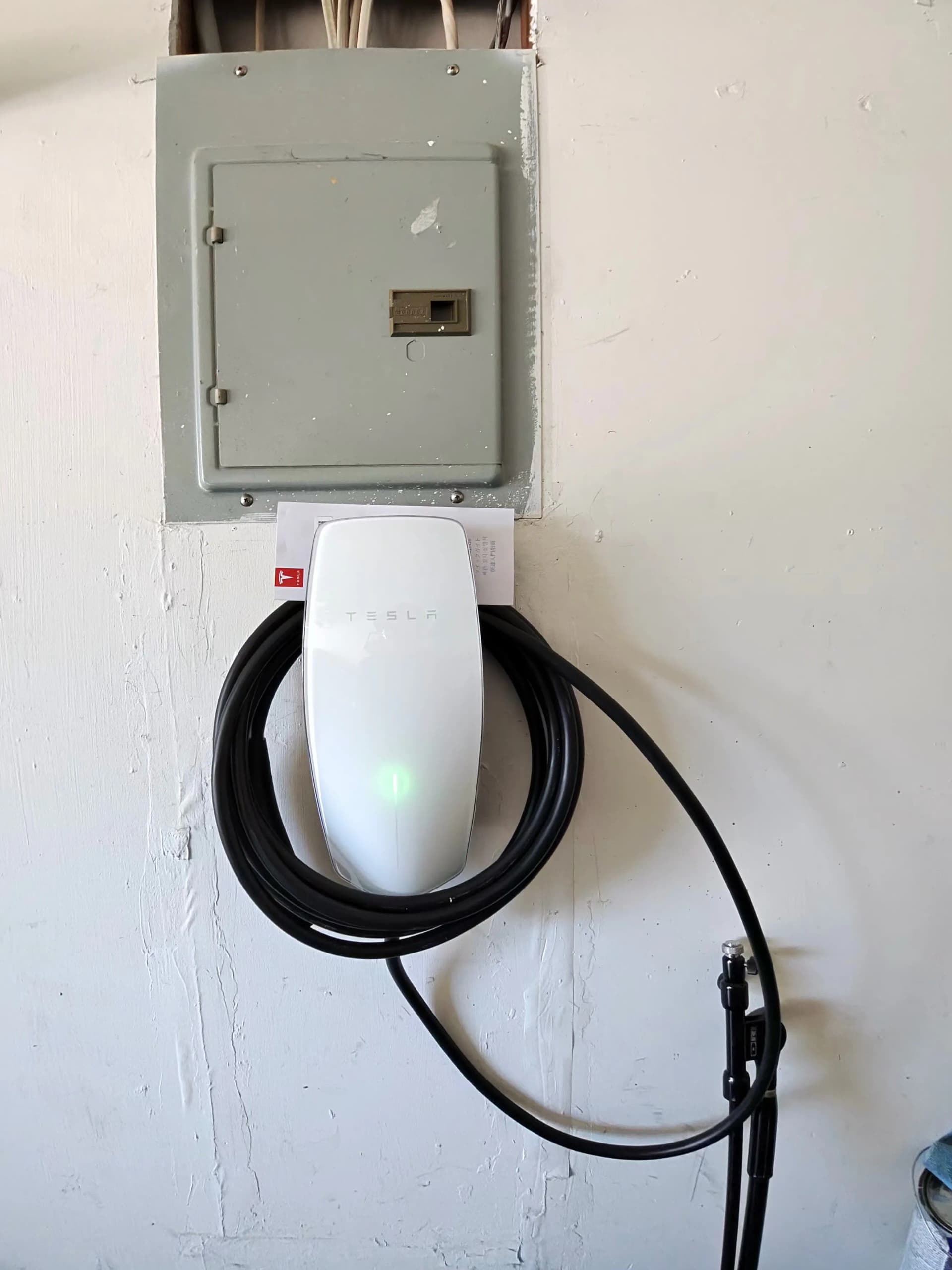 Tesla Wall Connector Installed in a Home Garage image