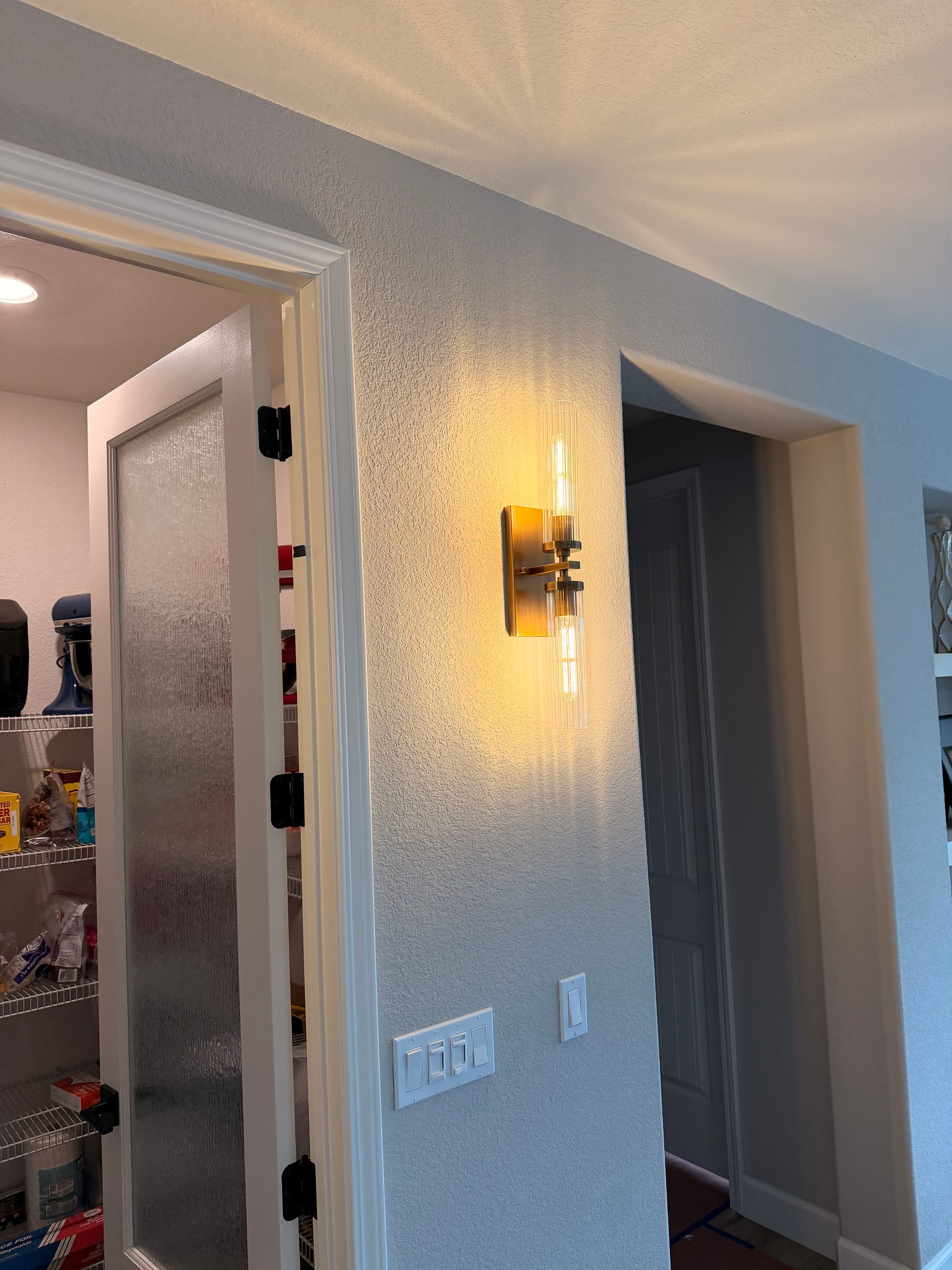 Stylish Sconce Lighting Added to Living Room image