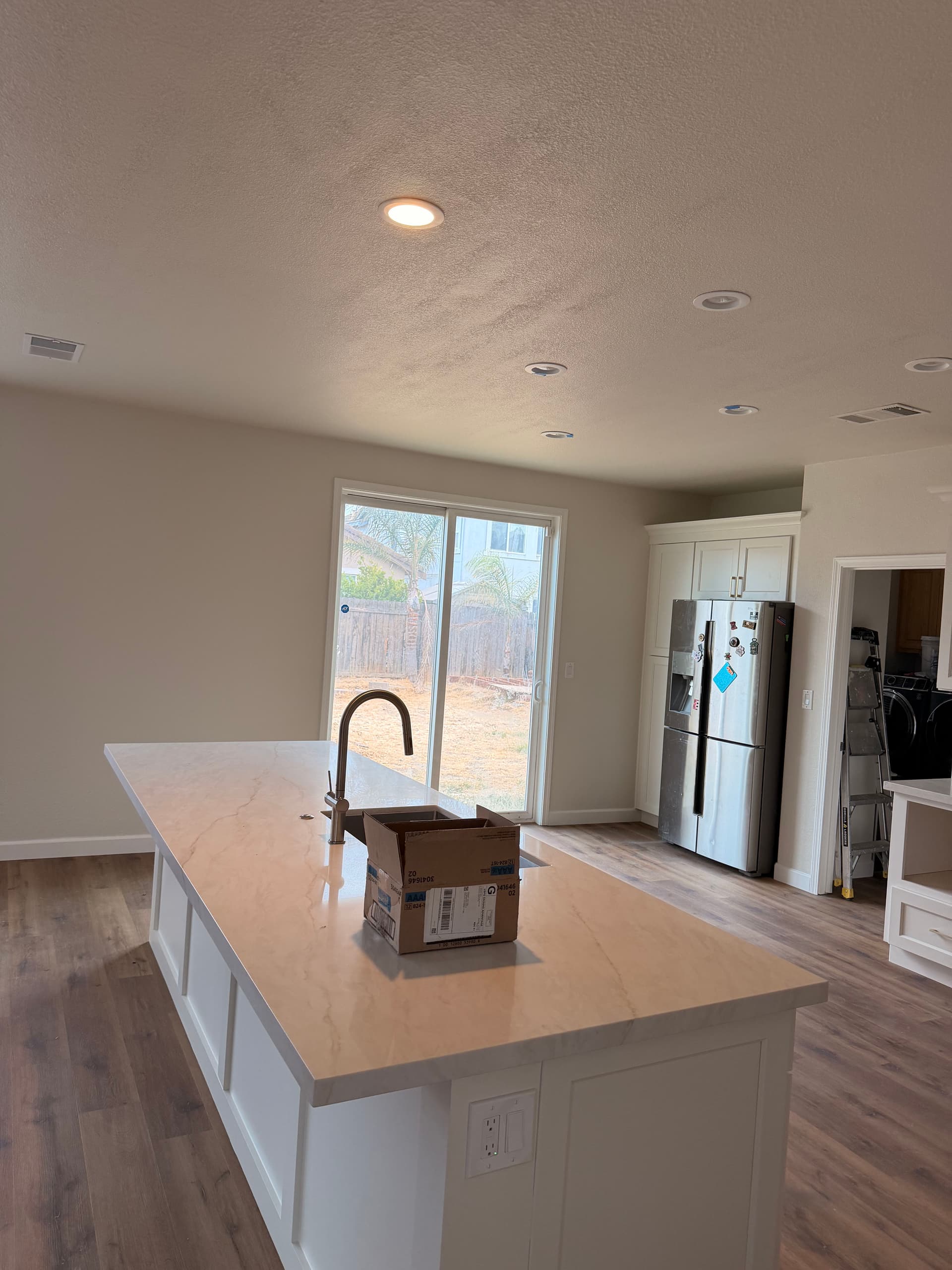 Kitchen Island Outlet and Switch Relocation Done Right image